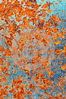 Teal and orange rust texture. photo