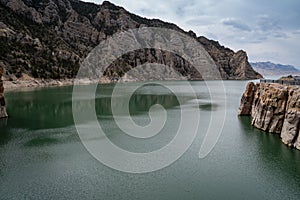 Teal water of the reservoir at Buffalo Bill Dam in Cody Wyoming photo