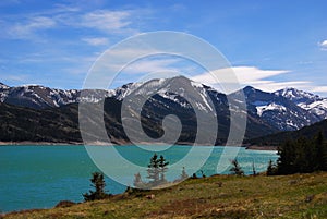 Teal waters of the Gibson Reservoir fed by the Sun river, Montana