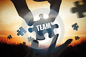 Team against orange sunrise