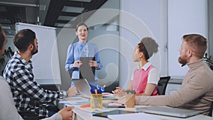 Team Applauding Successful Presentation in Office Meeting