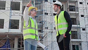Team architect or engineer inspection and planning construction at construction site.