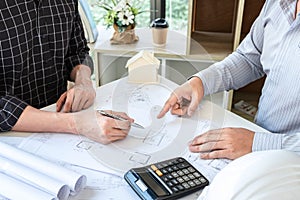 Team of architects or engineering consulting and analyzing working on objects tools and construction drawings inspection,
