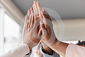 Team building, hands and business people high five in collaboration, support and circle of trust for motivation. Closeup