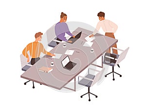 Team at business meeting at conference table. People work with laptops, documents together at office desk. Employees