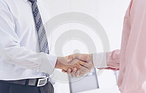 Team Business Partners shaking hands together to Greeting Start up new project. Shakehand Teamwork Partnership outside office