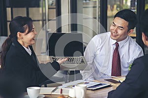 Team Business Partners shaking hands together to Greeting Start up small business in meeting room. Shakehand teamwork partners at