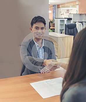 Team Business Partners shaking hands together to Greeting Start up small business in meeting room. Shakehand teamwork partners at photo