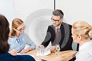 team of business people having conversation