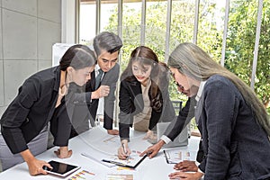 Team business working meeting room at the office. Team workers are talking business plan. Businessman presenting to colleagues at