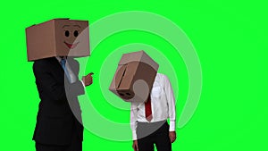 Team of businessman hiding head with box