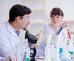 Team of chemists working in the lab
