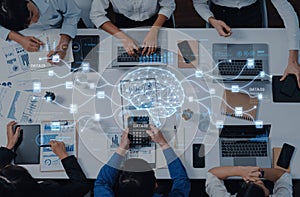 Team Collaboration on Data Analysis with Digital Brain Concept in Modern Office Setting, Emphasizing Technology and