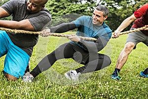 Team competing in tug of war