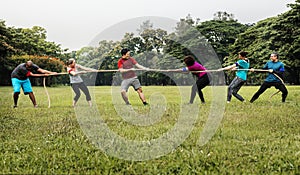 Team competing in tug of war