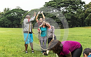 Team competing in tug of war photo