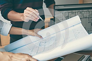 Team of Construction engineering or architect hands working on b