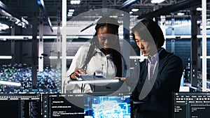 Team of data center engineers using machine learning algorithms