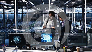 Team of data center engineers using machine learning algorithms