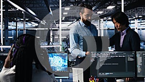 Team of data center engineers using machine learning algorithms