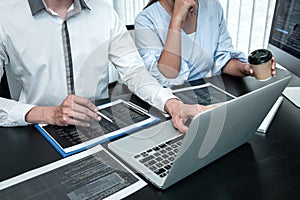Team of Developer programmer working on coding program software computer in office, Writing website and development database