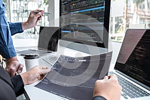 Team of developer programmer working on project in software development computer in IT company office, Writing codes and data code