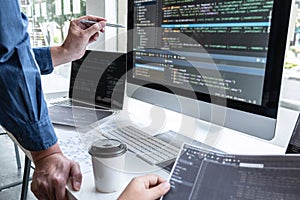 Team of developer programmer working on project in software development computer in IT company office, Writing codes and data code