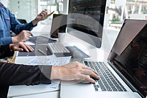 Team of developer programmer working on project in software development computer in IT company office, Writing codes and data code