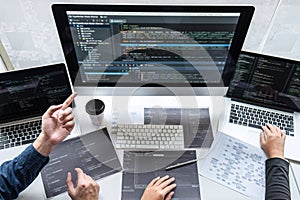 Team of developer programmer working on project in software development computer in IT company office, Writing codes and data code