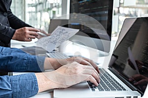 Team of developer programmer working on project in software development computer in IT company office, Writing codes and data code