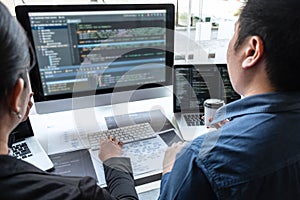 Team of developer programmer working on project in software development computer in IT company office, Writing codes and data code