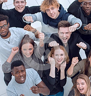 team of diverse young people looking at the camera