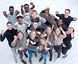 team of diverse young people looking at the camera