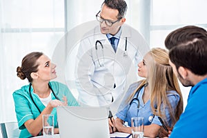 Team of doctors having conversation