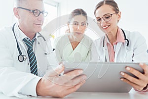Team of doctors in meeting discussing a case