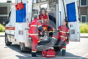 Team of EMS workers discussing something before their shift