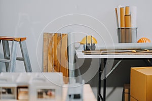 Team Engineers with draft plan of building on constructing site. Engineer work on site. engineer visit and inspection site