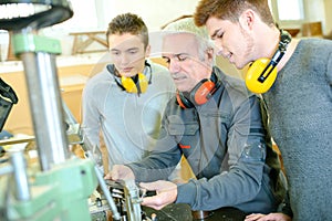 Team engineers working in factory