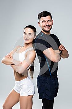 Team of fitness coaches man and woman isolated on white background