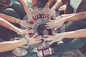 Team and friendship concept with crowd of hands and feet all together touching and cooperate - caucasian people friends enjoying