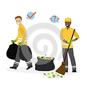 Team of garbage collectors at work. Multiethnic male workers in special uniform. Two scavengers remove garbage, leaves. Garbage photo