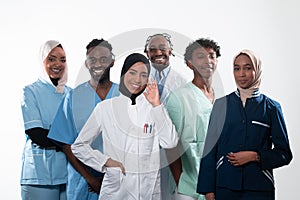 Team or group of a doctor, nurse and medical professional coworkers standing together. Portrait of diverse healthcare