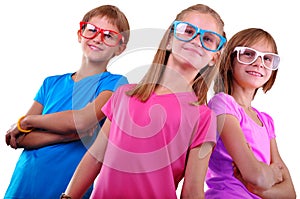 Team of happy children wearing eyeglasses isolated over white