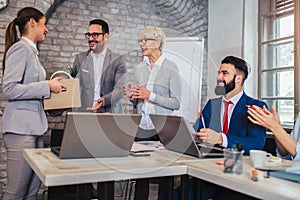 Team leader executive introducing new just hired female employee to colleagues