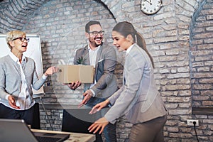 Team leader executive introducing new just hired female employee to colleagues