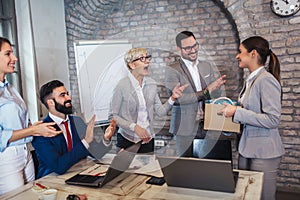 Team leader executive introducing new just hired female employee to colleagues