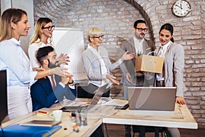 Team leader executive introducing new just hired female employee to colleagues