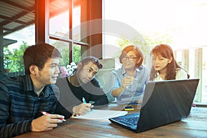 Team of man and woman freelance meeting for working solution in photo