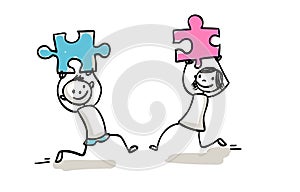 Team of man and woman holding up puzzle to make a connection or find solution -