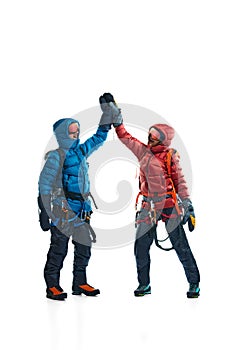 Team. Man and woman in special mountaineering equipment. Jacket, boots, goggles and backpack isolated on white